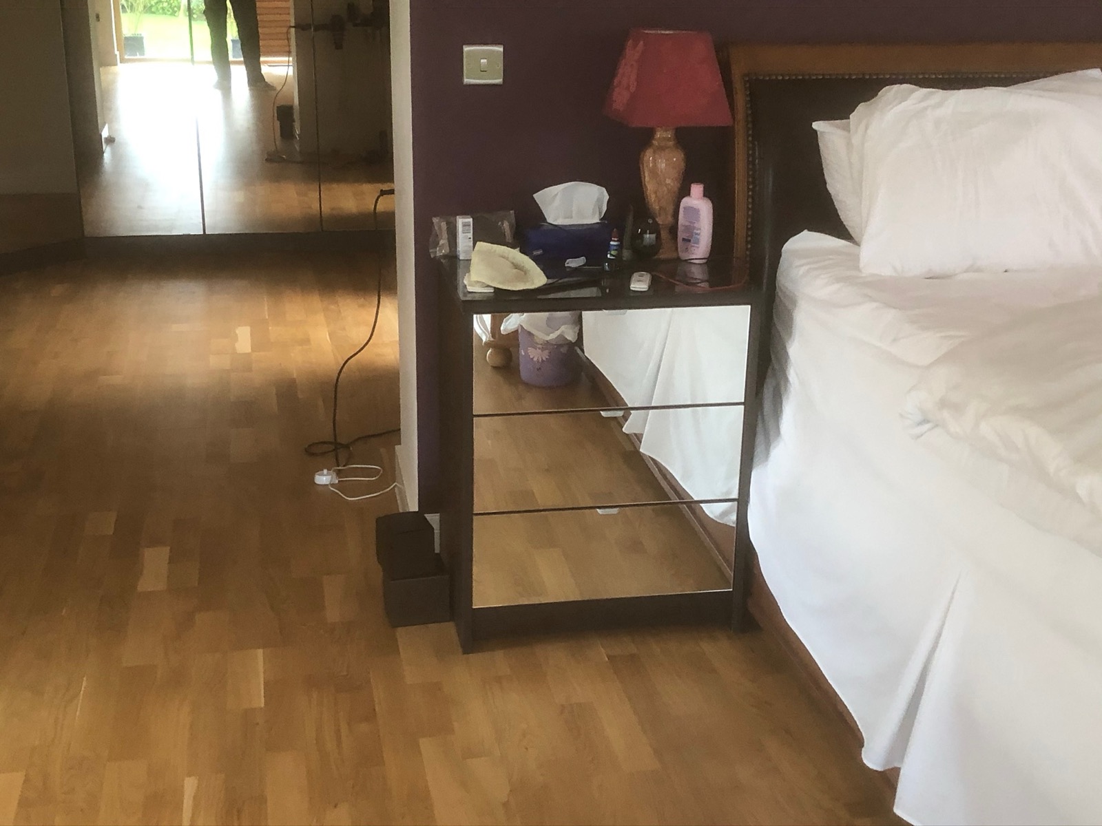 Bedside mirrored cabinet close-up, made and fitted by Sussex Design Interiors