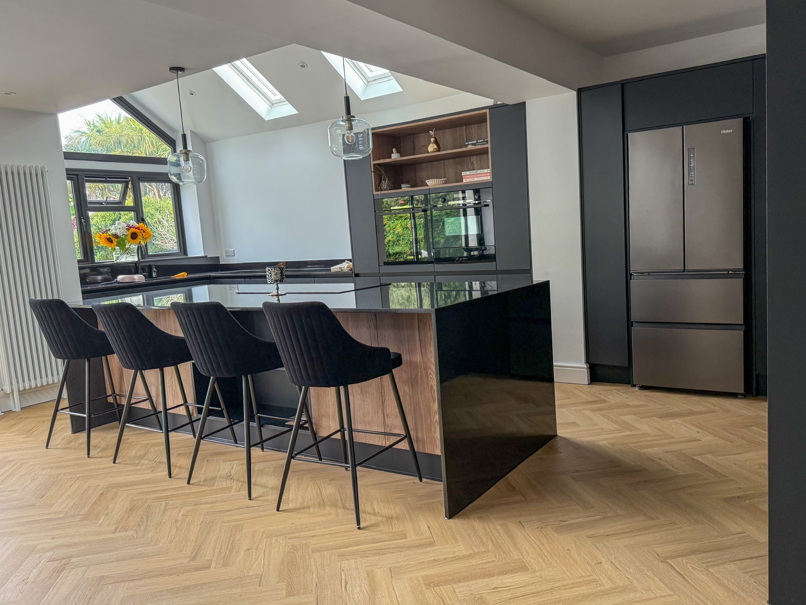 Kitchen black oak island skylight fridge freezer, made and fitted by Sussex Design Interiors