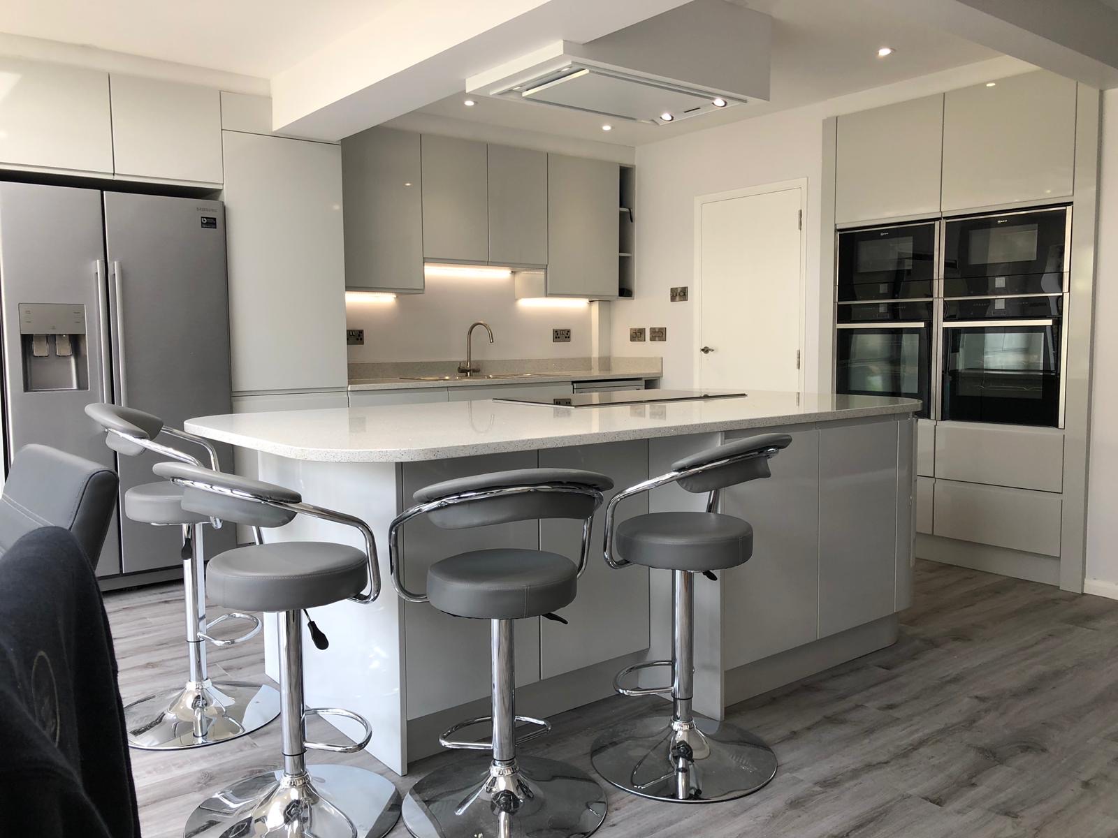 Kitchen grey gloss island fridge freezer, made and fitted by Sussex Design Interiors