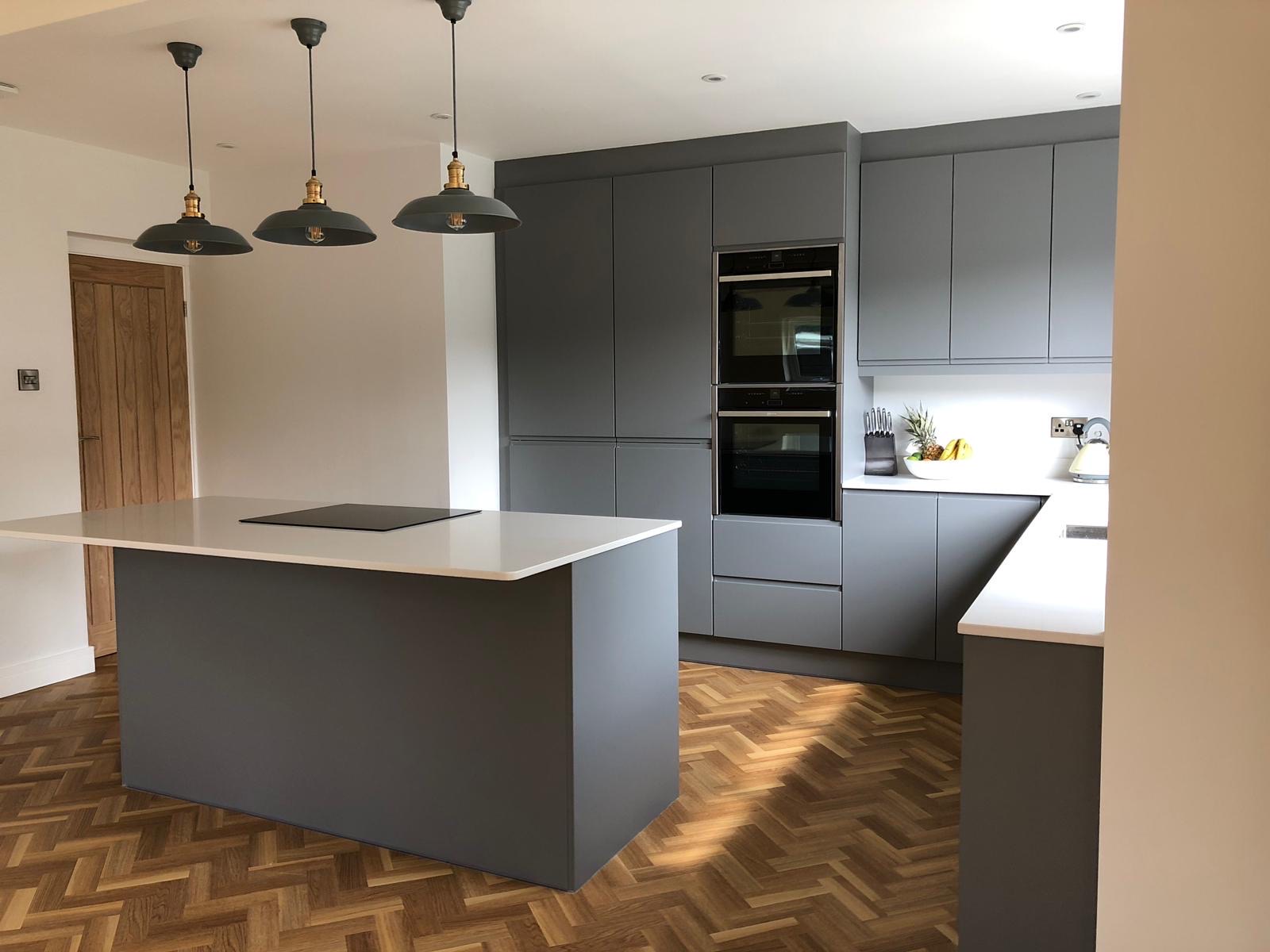 Kitchen matte grey herringbone floor pendant lights, made and fitted by Sussex Design Interiors