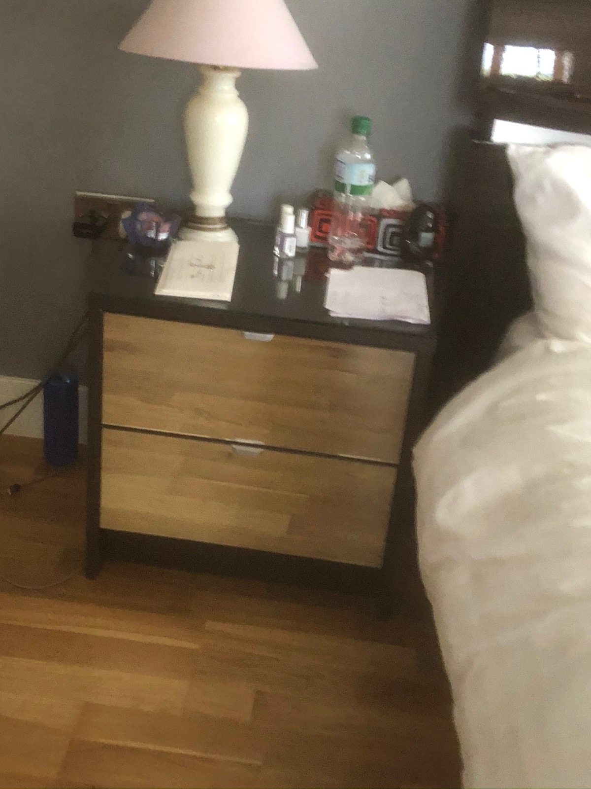 Mirrored bedside table lamp close-up, made and fitted by Sussex Design Interiors